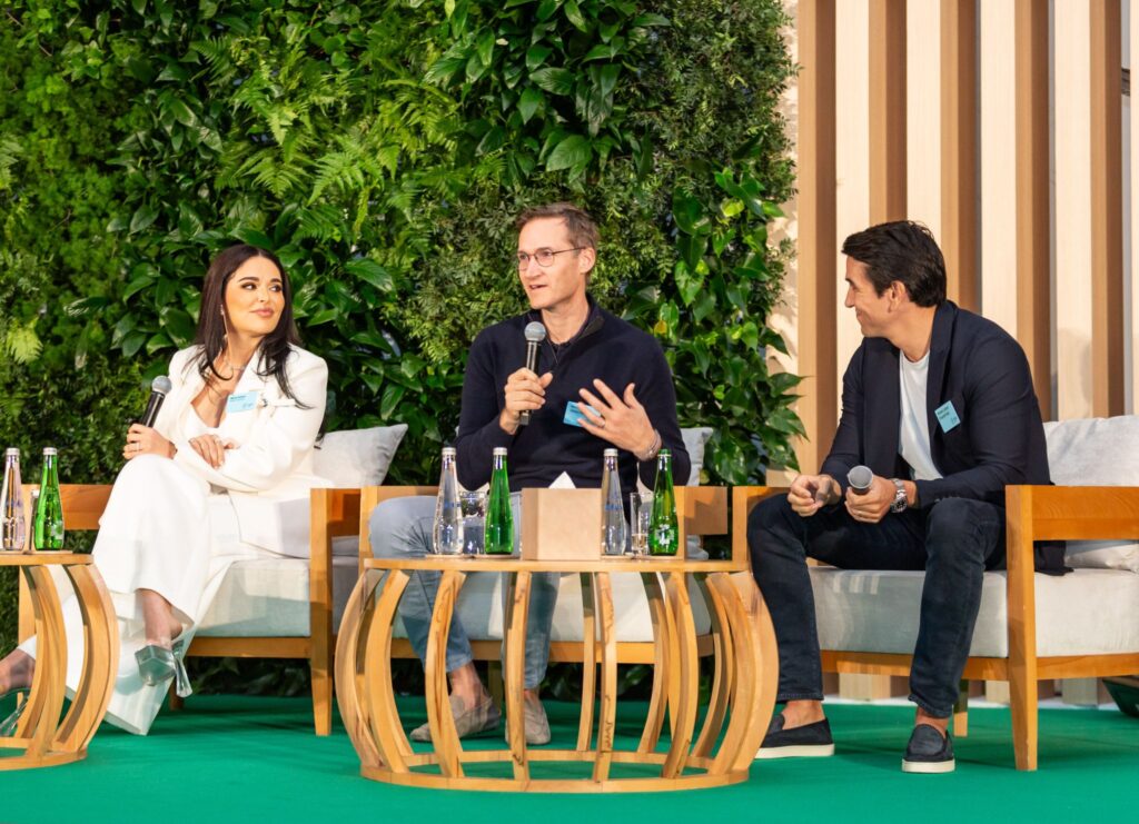 Mona Kattan (Huda Beauty), Niklas Ostburg (Delivery Hero), and Michael Lahyani (Property Finder) sharing their founder stories at FF100 Dubai